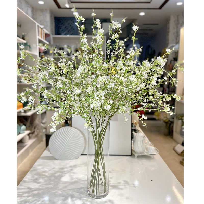 Bình Gốm Hay Bình Thủy Tinh Cắm Hoa Tuyết Mai Đẹp Hơn? Lý Do Nhiều Người Chọn Bình Gốm Cắm Hoa Tươi